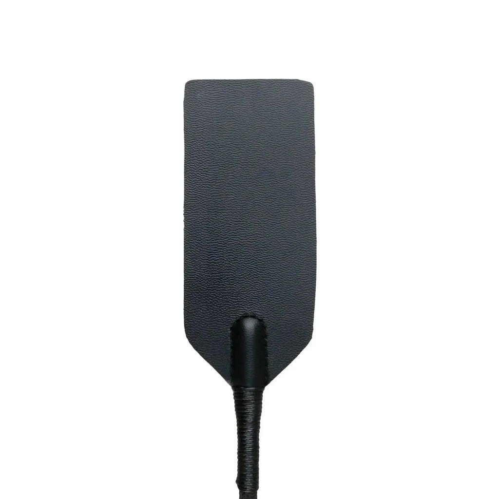 Black leather rectangle crop whip with textured surface and braided handle from the fetish collection