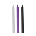 Three slender taper candles in white purple and black from the fetish collection sensual hot wax candles 3 pc set