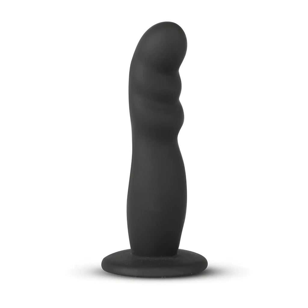 Black silicone anal plug with textured ridges and circular base from fetish collection silicone realistic strap-on