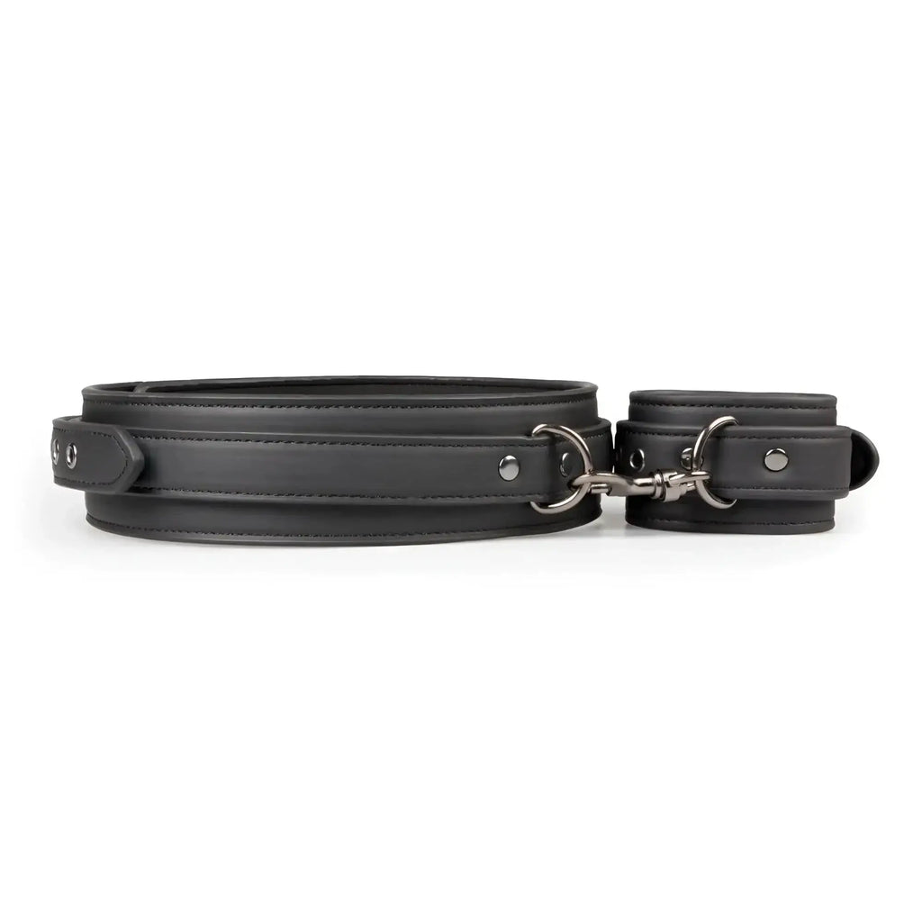 Fetish collection black leather thigh and wrist cuff set with silver toned metal hardware for restraint play