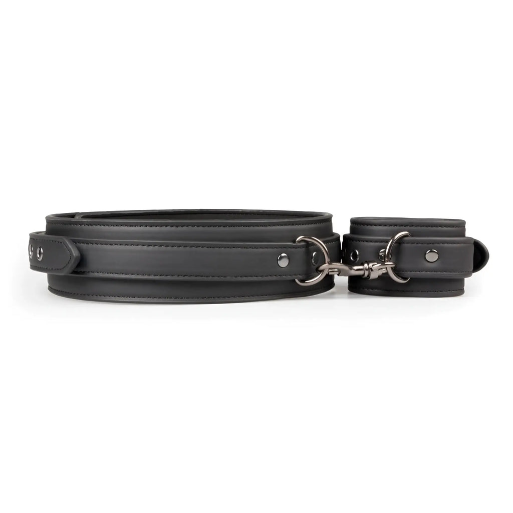 Fetish collection black leather thigh and wrist cuff set with silver toned metal hardware for restraint play