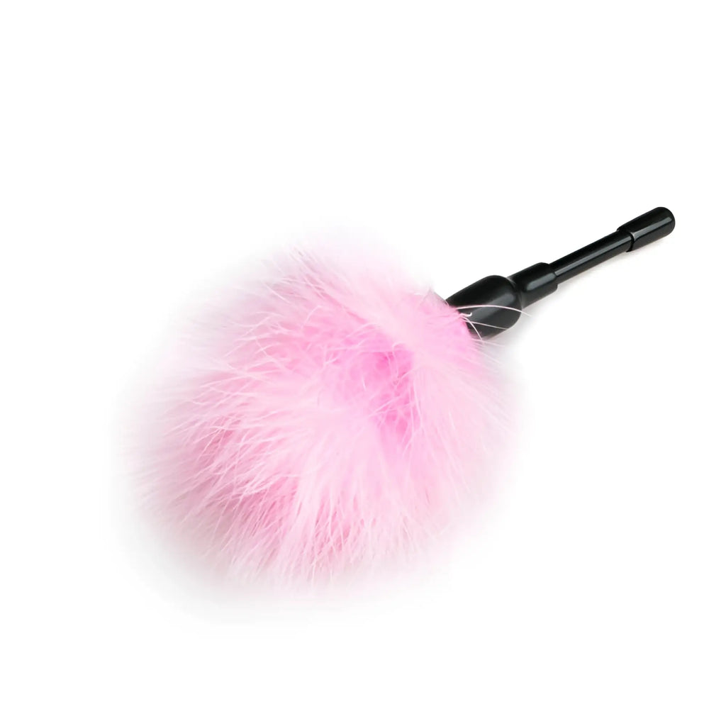 Pink feather duster tickler with black handle from fetish collection small for light sensory play