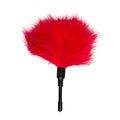 A vibrant red feather duster tickler with a sleek black handle from the fetish collection for sensual play