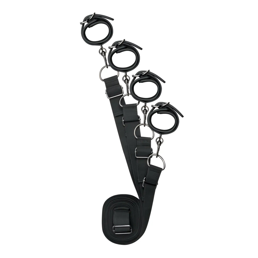 Black leather bondage set with four adjustable cuffs and metal hardware from the fetish collection under mattress restraint set
