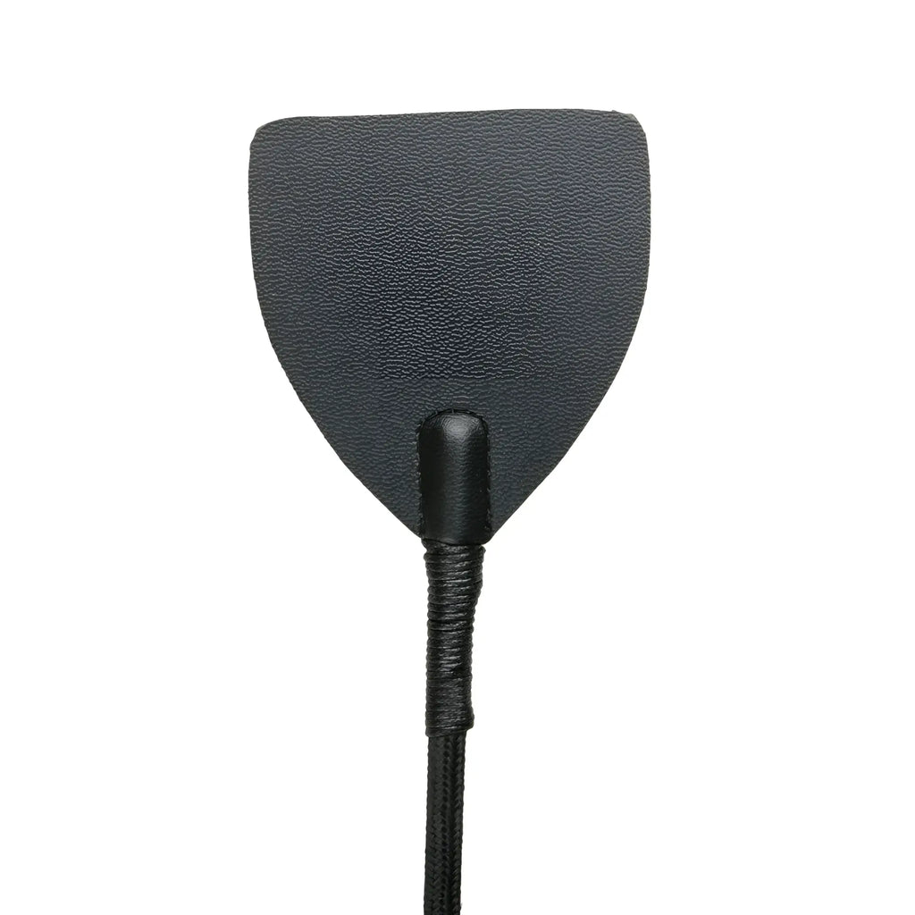 Black leather wide crop whip from fetish collection with textured shield-shaped head and braided handle