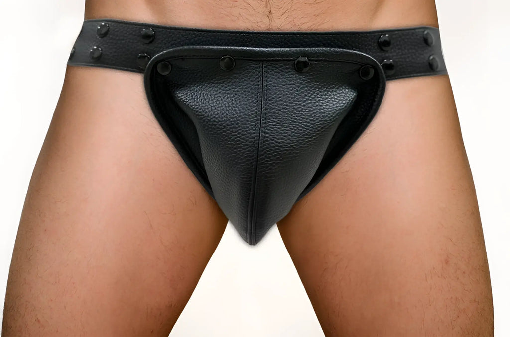 Black leather thong jockstrap with removable pouch textured surface and decorative rivets along waistband