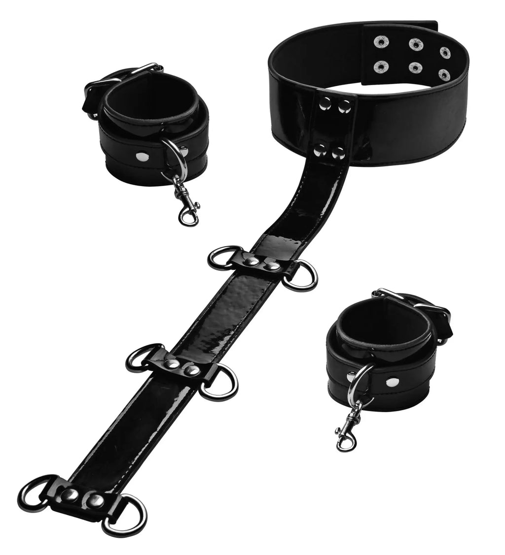 Frisky bound around neck to wrist restraints in black patent leather with silver metal hardware and adjustable straps