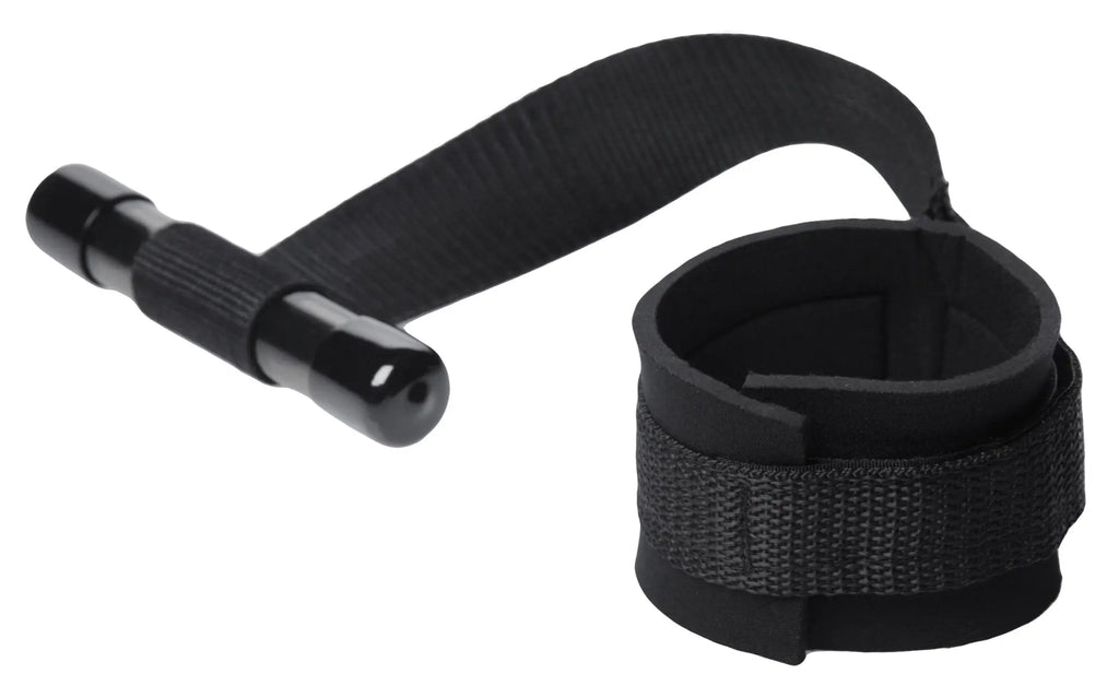 Black adjustable wrist cuff with textured fabric strap and metallic end piece for frisky entryway door restraints