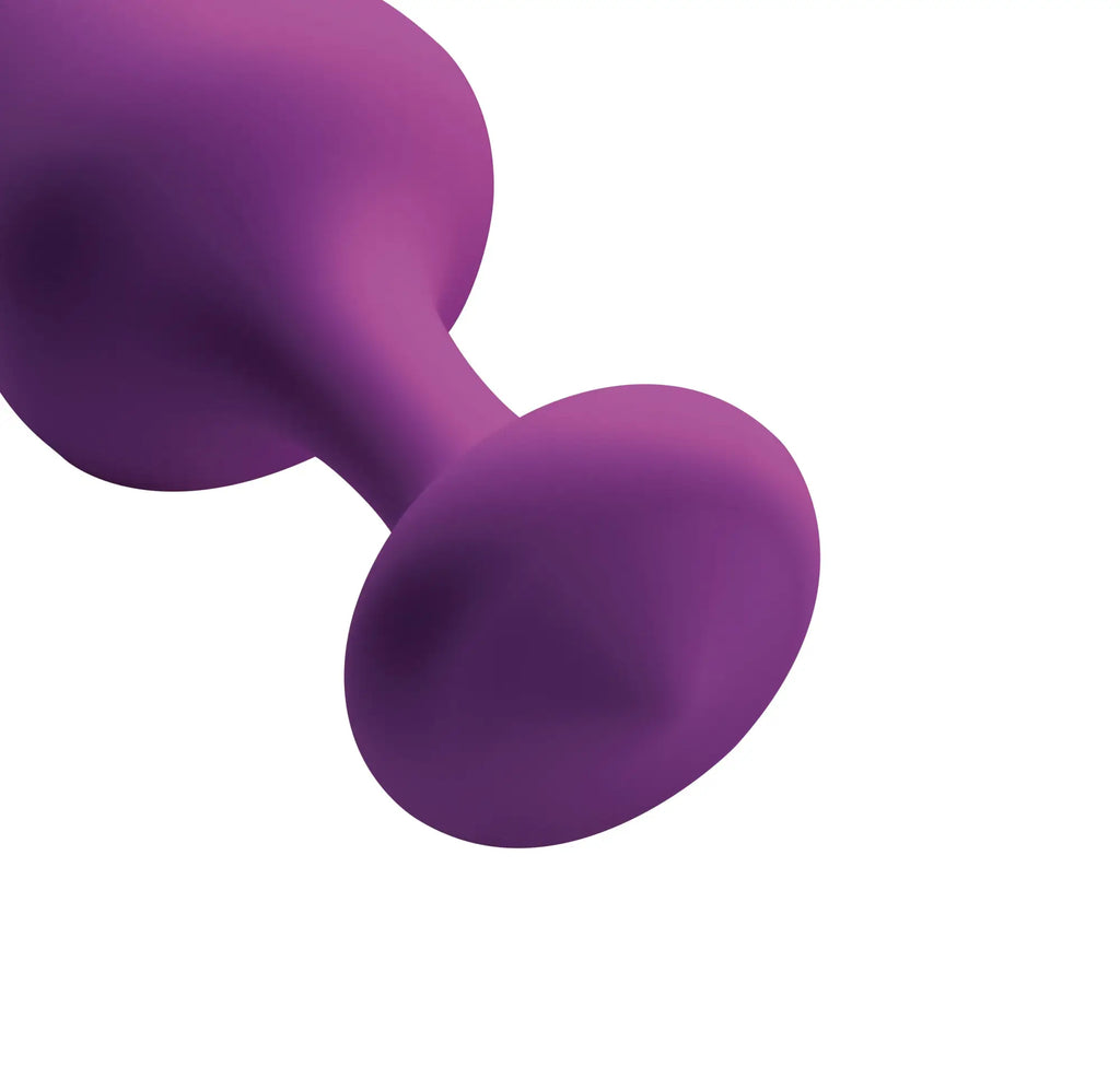 Purple silicone anal plug with smooth rounded design and two bulbous ends from frisky purple pleasures 3 pc set