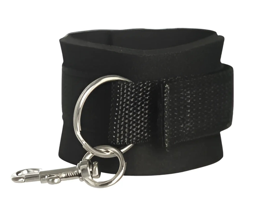 Black fabric wrist cuff with silver metal ring and keychain attachment from frisky stay put cross tie restraints
