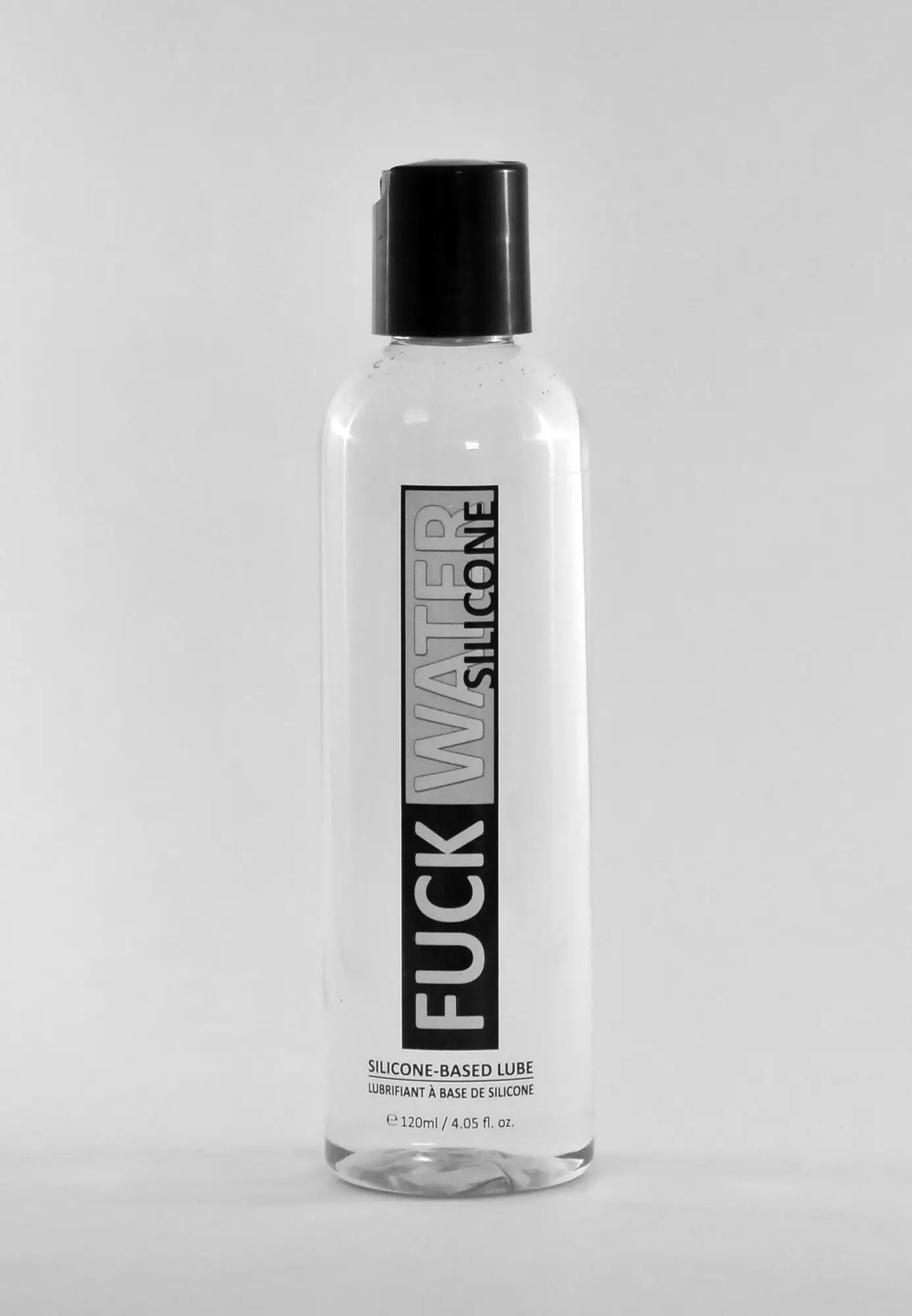 Clear plastic bottle with black cap labeled fuckwater silicone lubricant 4oz 120ml for personal use