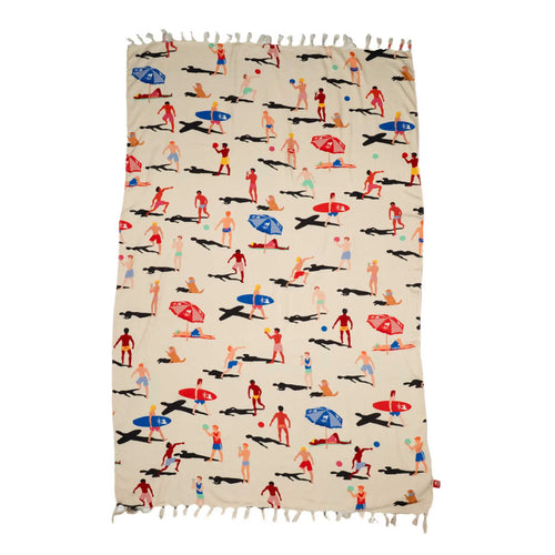 Cream fringed textile covered with small colorful beach-scene illustrations.