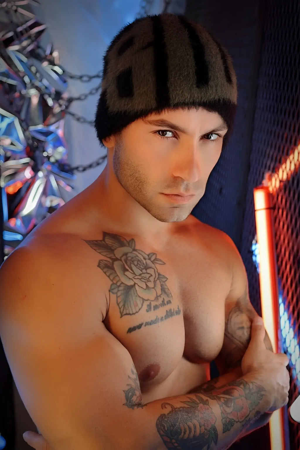 Dark green knit Fuzz Daddy beanie with black vertical stripes made of warm soft yarn for cold weather use