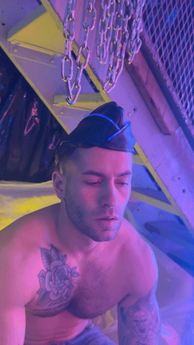 A black leather garrison hat with blue glowing trim showcasing a futuristic design