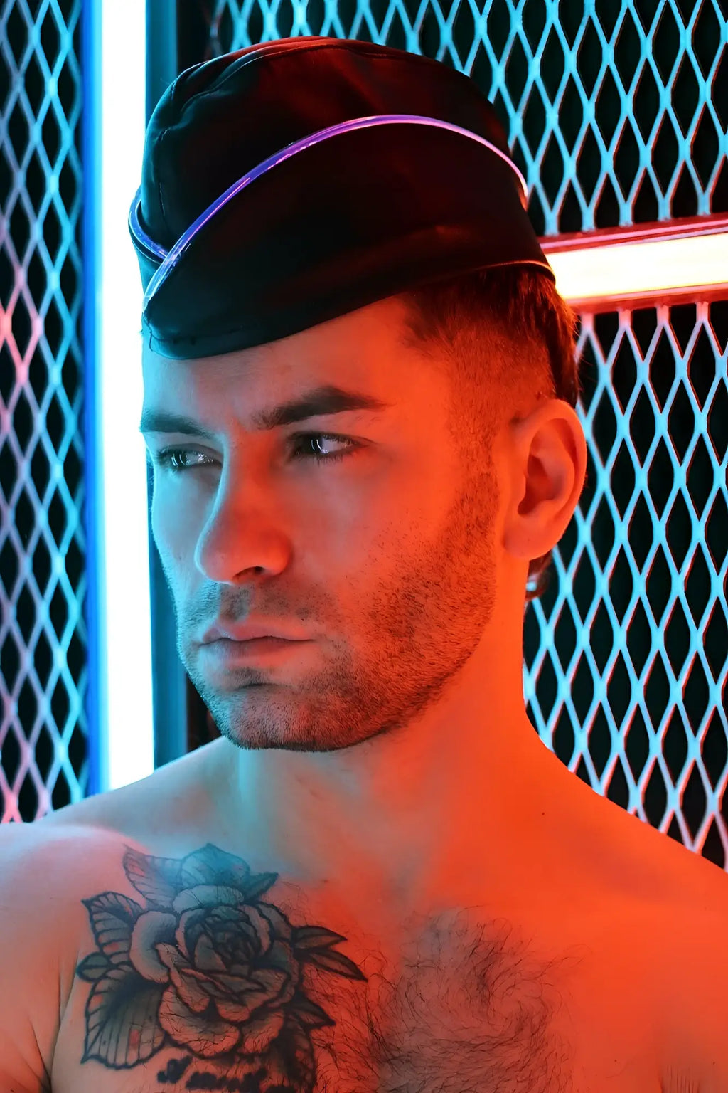 Black leather garrison hat with a glowing purple stripe highlighting its sleek design