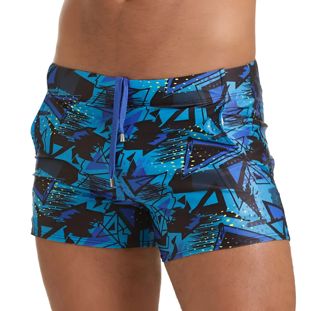 Gigo abstract beachwear blue and black geometric-patterned swim trunks with matching drawstring waistband