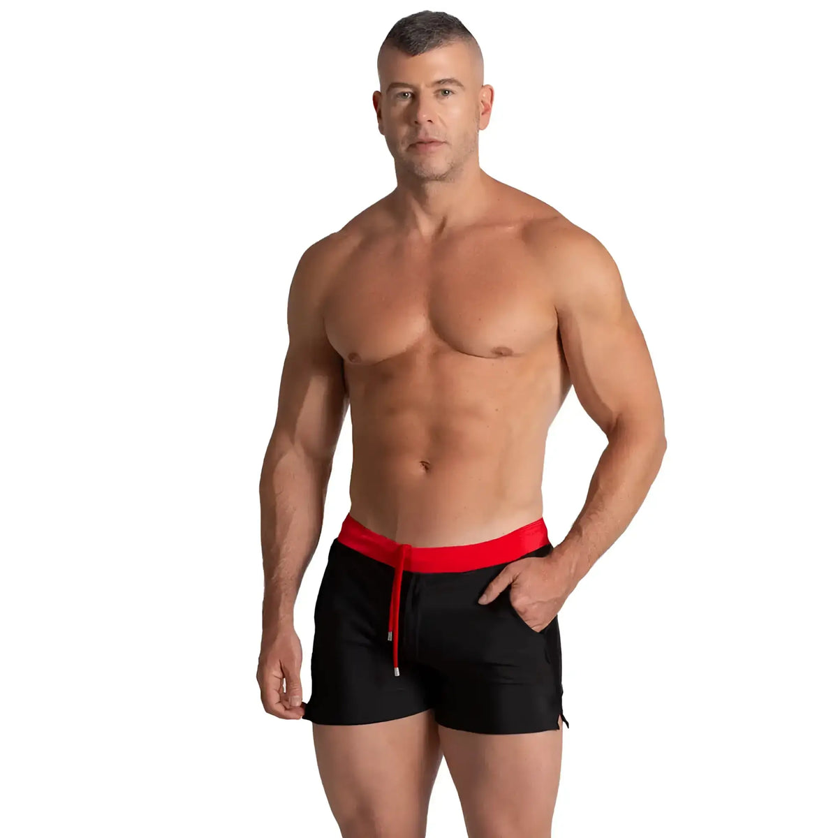 Black athletic shorts with a vibrant red waistband and drawstring from gigo alfa beachwear collection