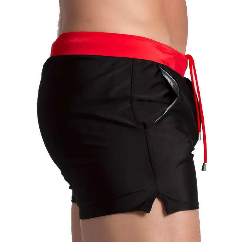 Black swim trunks with bold red waistband and matching drawstring from Gigo Alfa black red beachwear collection