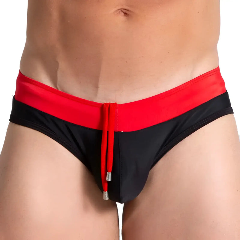Gigo Alfa black red swim brief with bold colour-block design wide red waistband and matching drawstring
