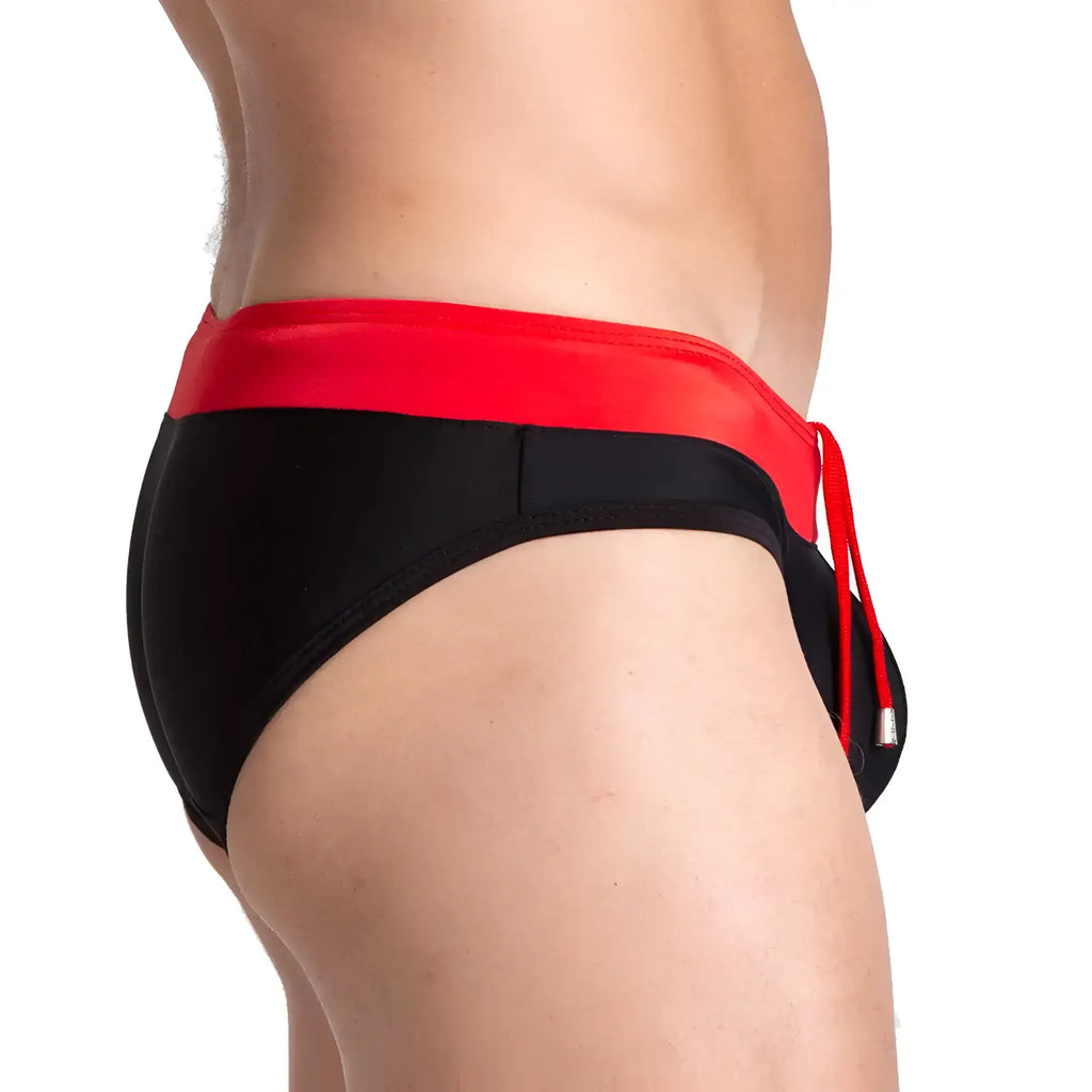 Black swim briefs with a bold red waistband and matching drawstring designed for swimming by gigo alfa