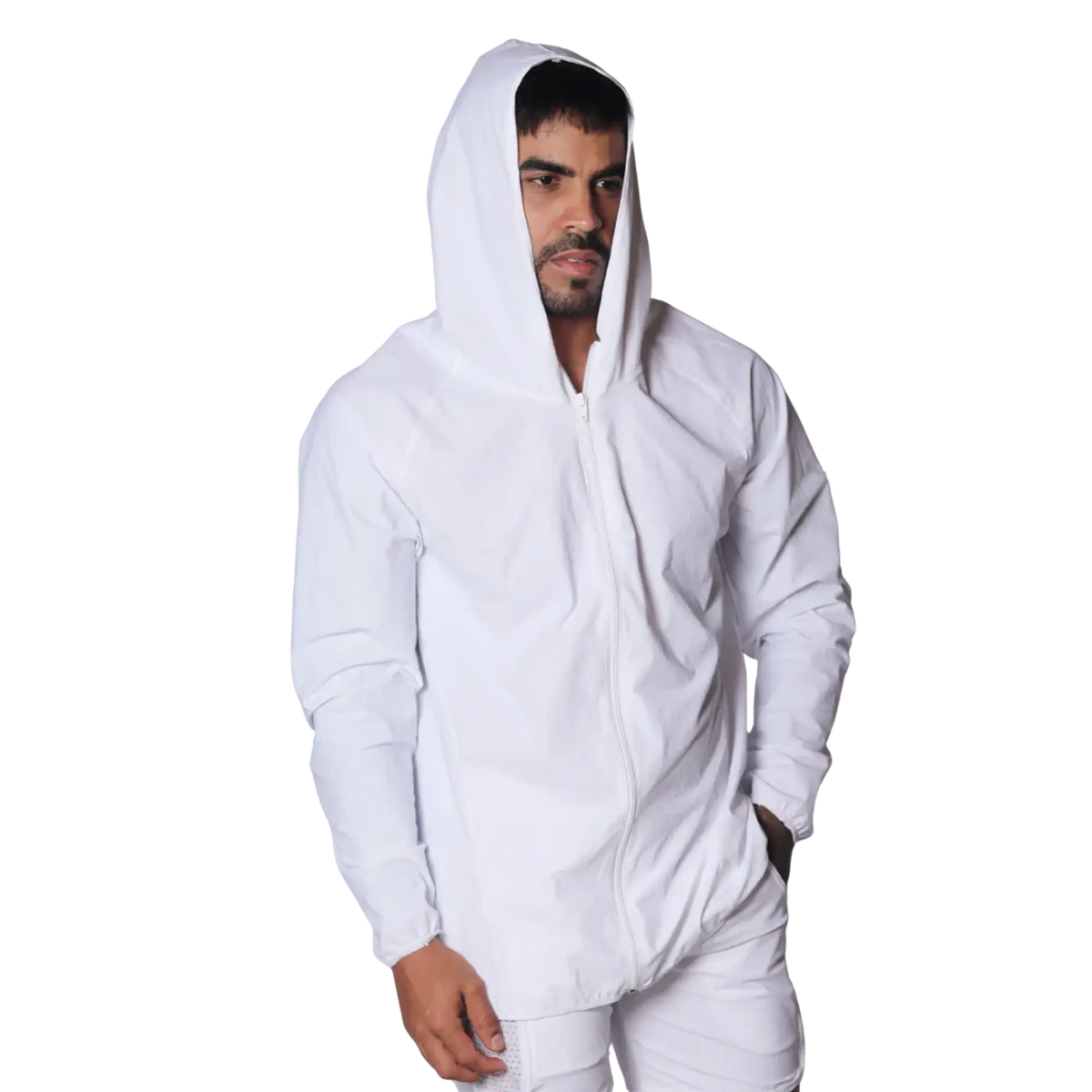 Minimalist white hooded windbreaker jacket with a front zipper and long sleeves, worn by a man against a black backdrop.