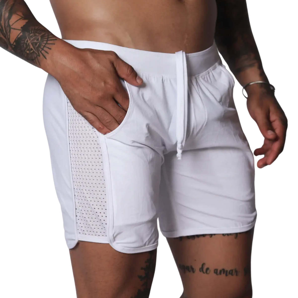 White athletic shorts with a drawstring waistband and side panels made of breathable mesh fabric.