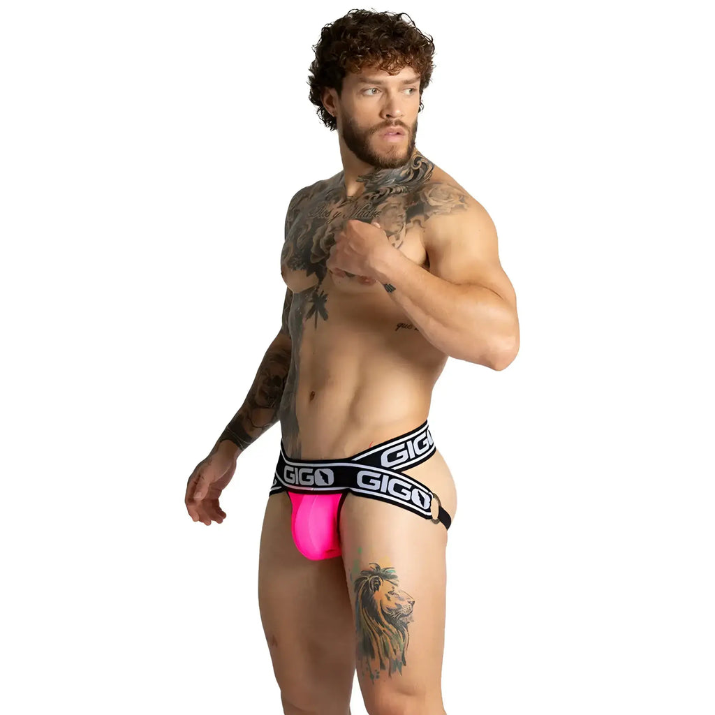 Bright pink gigo brand briefs with black elastic waistband and white lettering designed for audacy fuchsia jock style