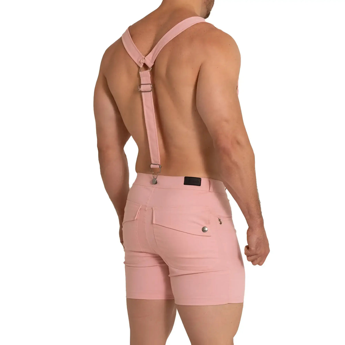 Pink suspenders with adjustable straps and metal clasps paired with matching pink shorts from gigo aventurer