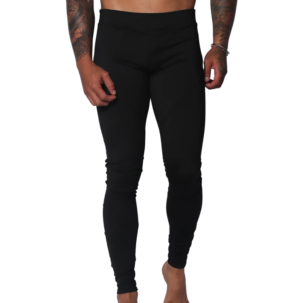 Form-fitting black Lycra leggings featuring a high-rise elastic waistband and a sleek, minimalist design.