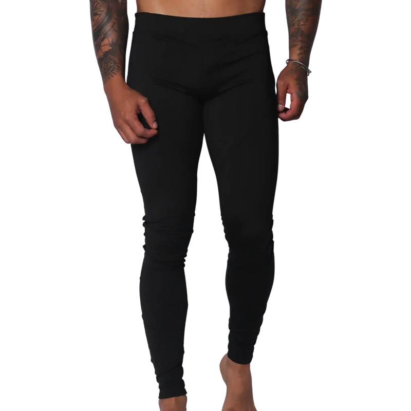 Form-fitting black Lycra leggings featuring a high-rise elastic waistband and a sleek, minimalist design.