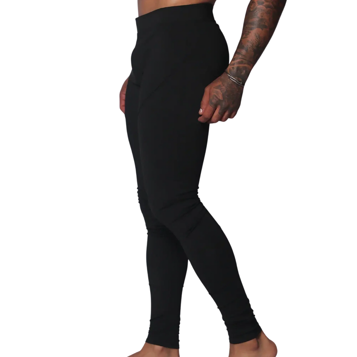 Form-fitting black Lycra leggings featuring a high-rise waistband and minimalist athletic design.