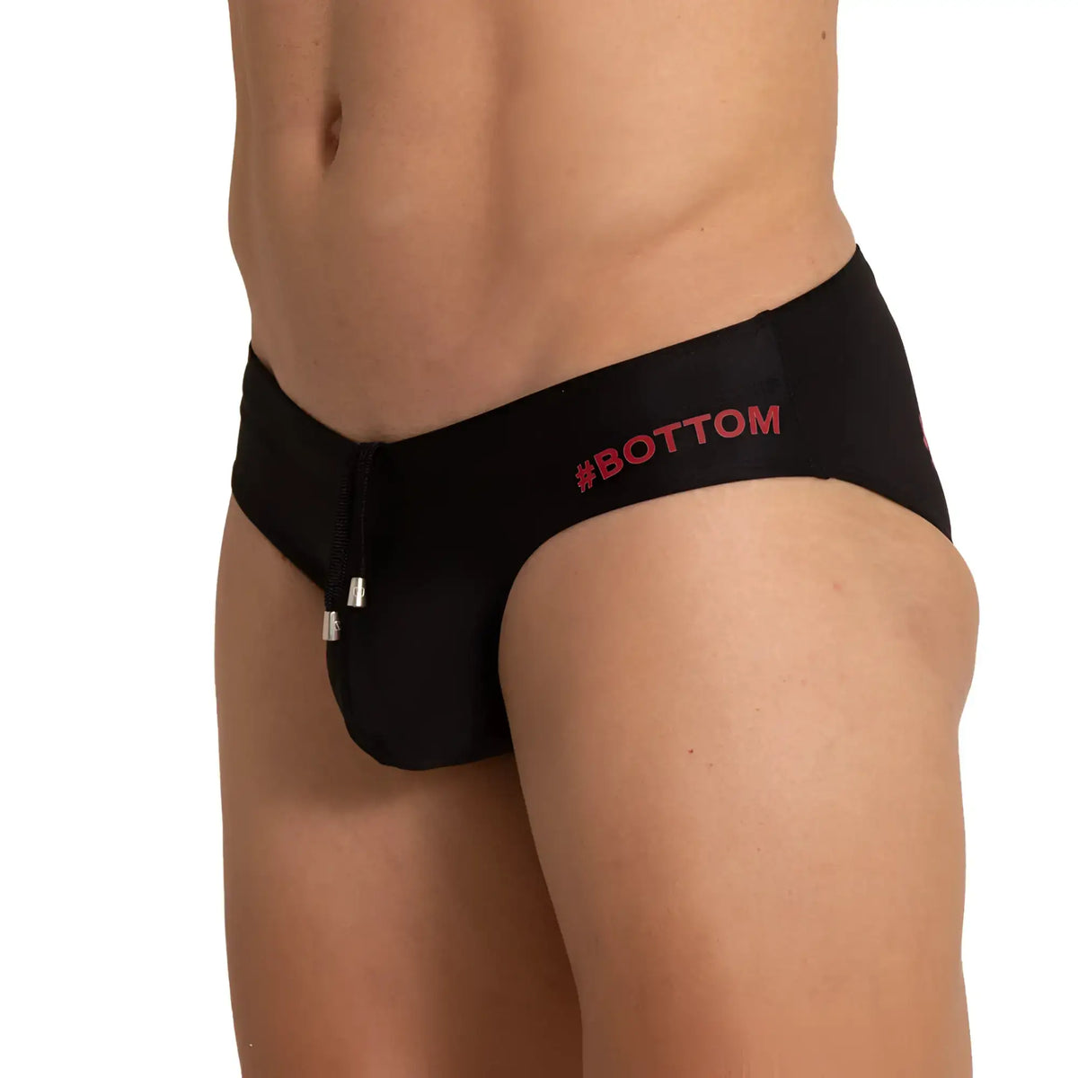 Black menÃ¢â‚¬â„¢s swim briefs with red bottom logo and silver zipper pull in gigo bottom black swim brief design