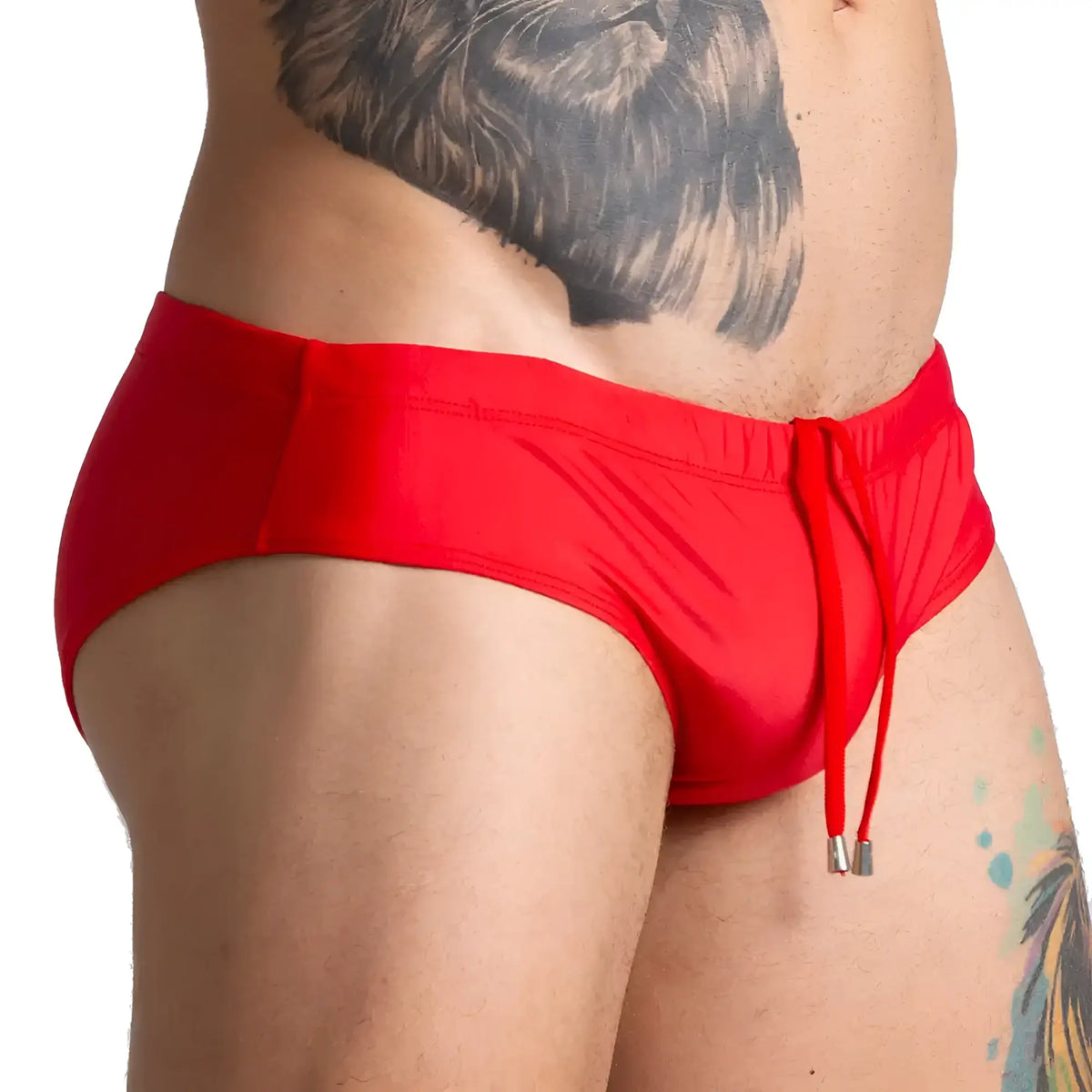 Gigo Brazilian red swim brief with bright red fabric and drawstring waistband featuring metallic aglets