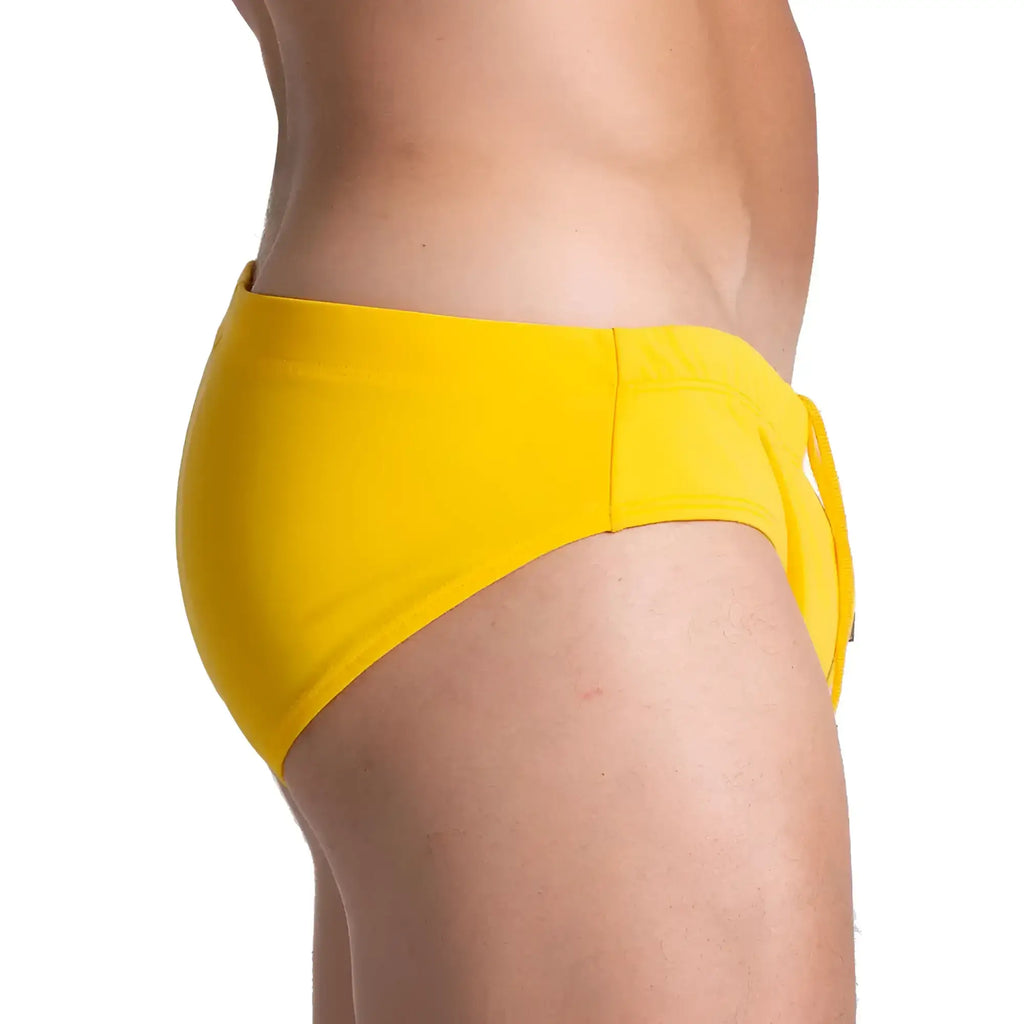 Bright yellow Gigo Brazilian swim brief with tied side closure designed for swimming and beachwear