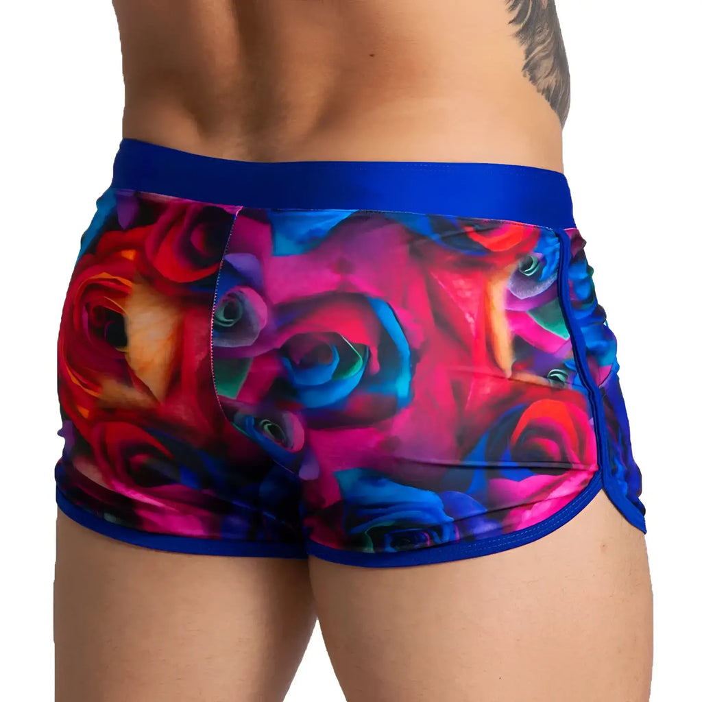 Gigo carnations beachwear vibrant multicoloured rose-patterned menÃ¢â‚¬â„¢s shorts with bold blue elastic waistband and trim