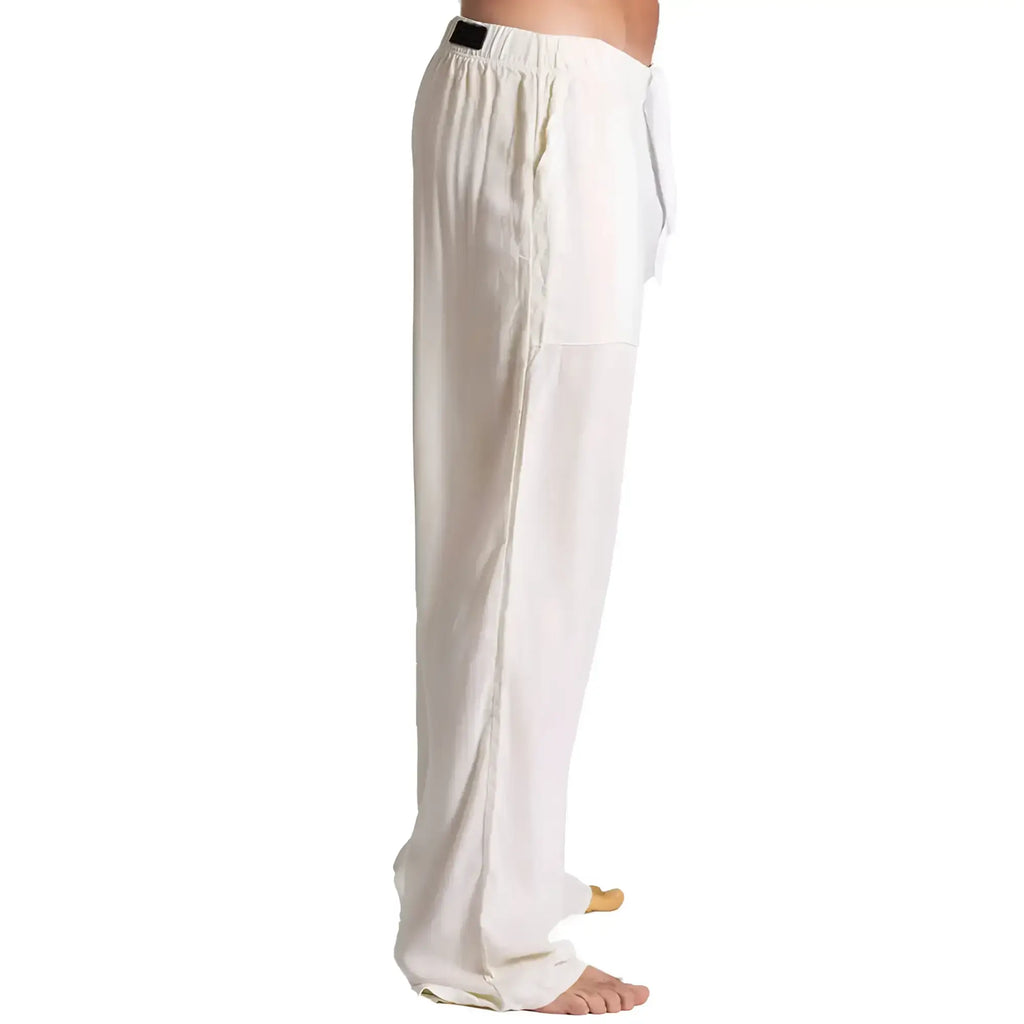 White loose-fitting Gigo Chalis beige pants with drawstring waist and subtle side seam detailing