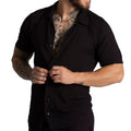 Gigo Chalis black short-sleeved button-up shirt with collar and subtle texture in lightweight fabric