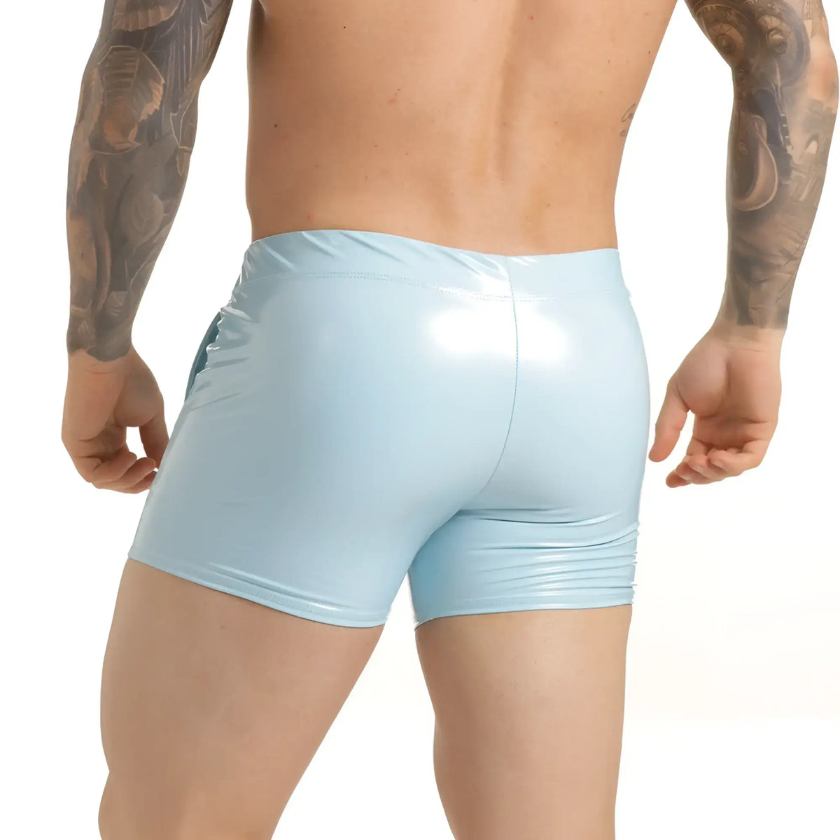 Light blue glossy patent leather shorts with snug fit and visible seam detail gigo charol blue hotshort
