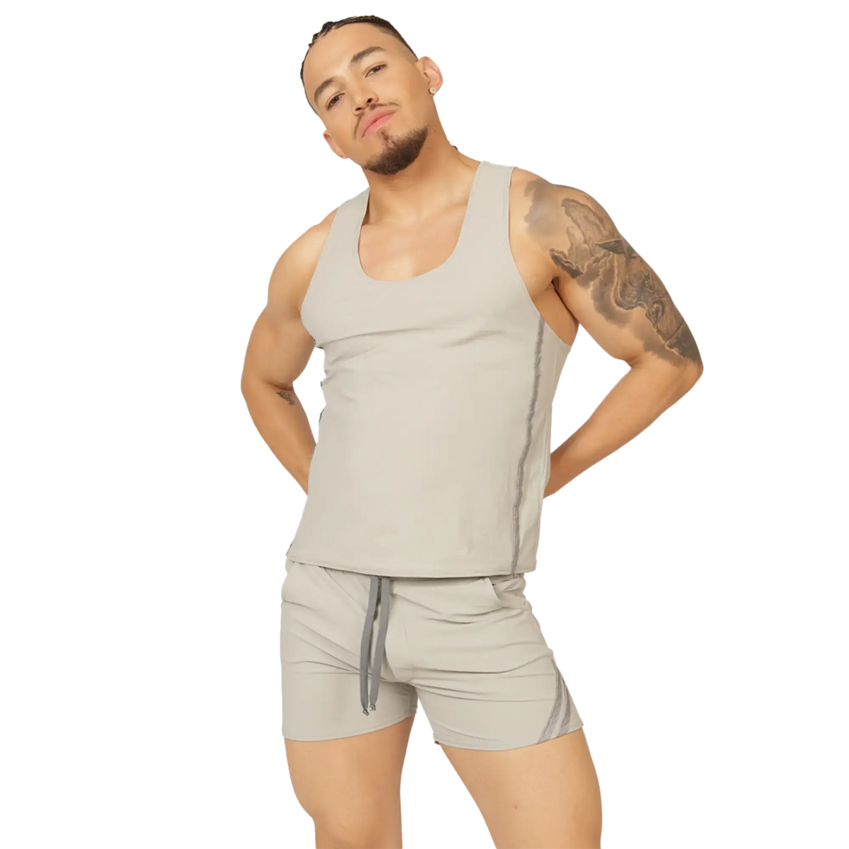 A man wearing a gigo club gray tank sleeveless light gray tank top with subtle side seams
