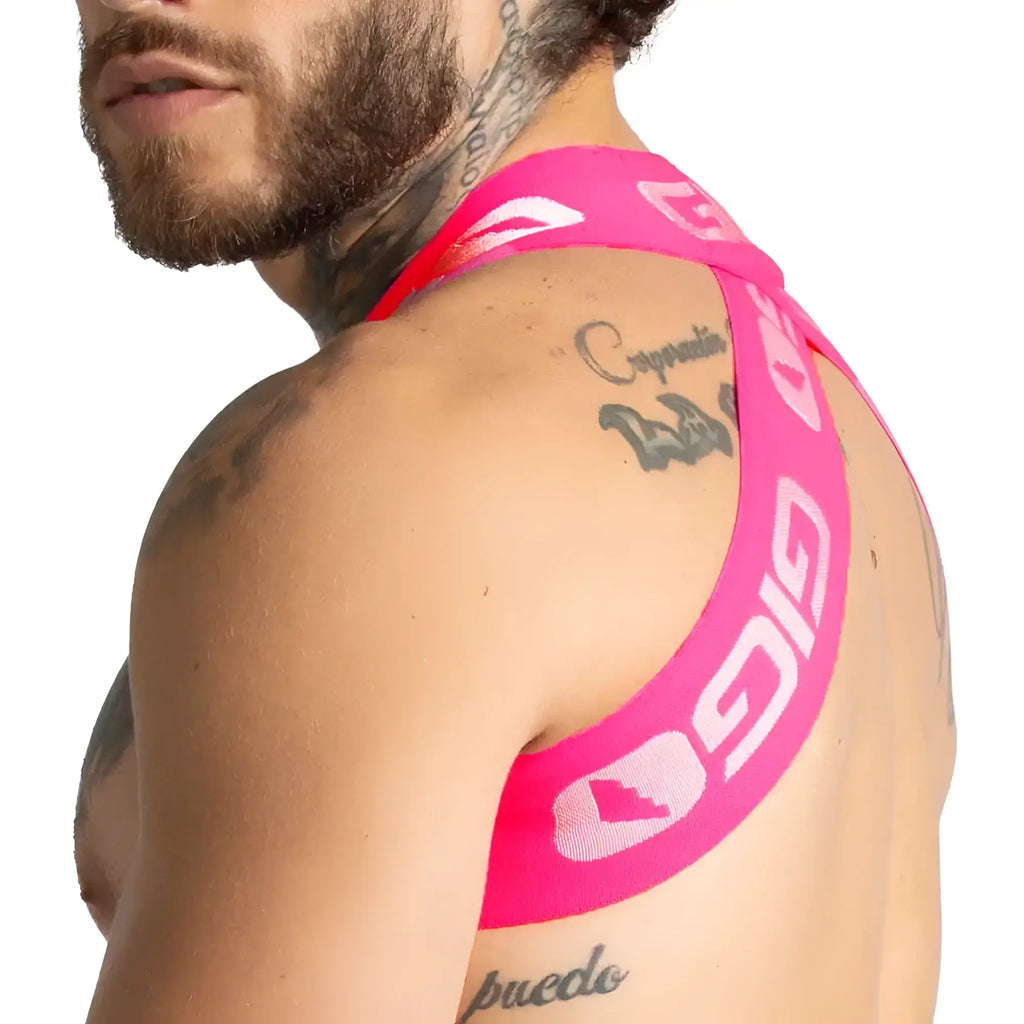 Bright pink athletic support band with white logo and text from gigo colours fucshia harness collection