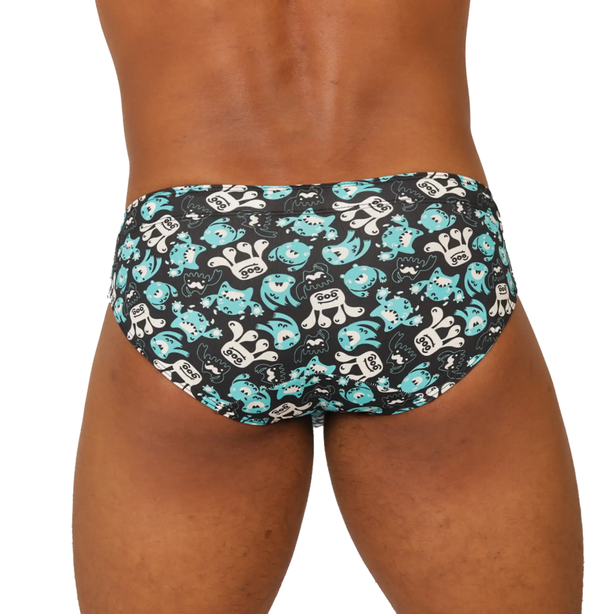 Black gigo comics swimbrief swim trunks with playful turquoise and white cartoon shark pattern for beachwear