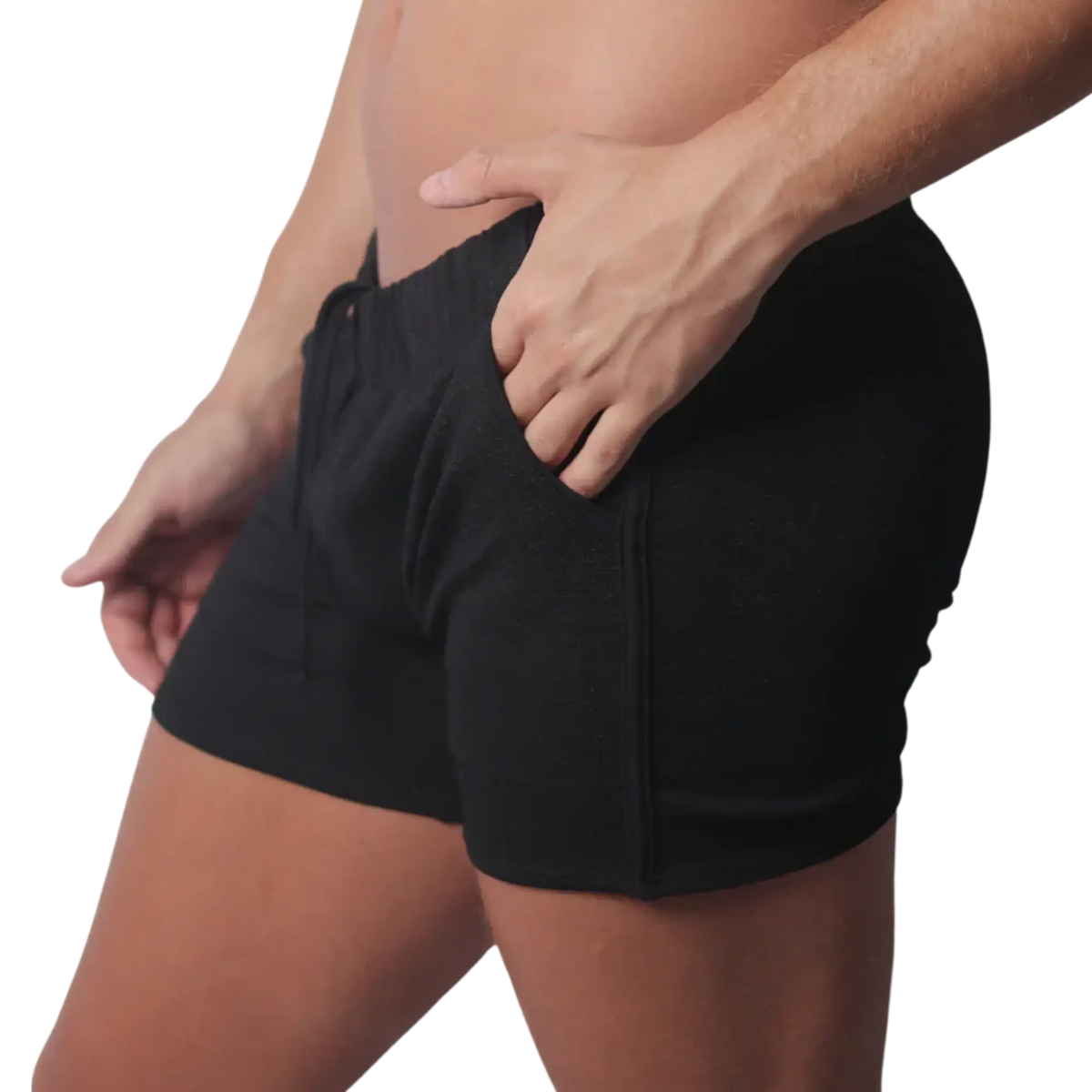 Black knit athletic shorts with an elastic drawstring waistband and side pocket detailing.