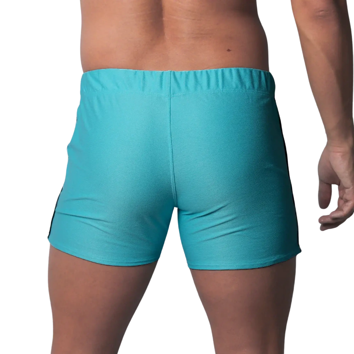 Back view of turquoise blue fitted athletic shorts with a textured honeycomb fabric and an elastic waistband.