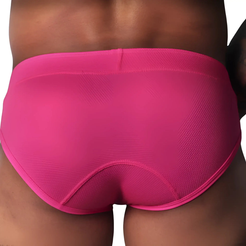 Fuchsia-coloured briefs in a textured, honeycomb-patterned fabric with a contoured back seam.