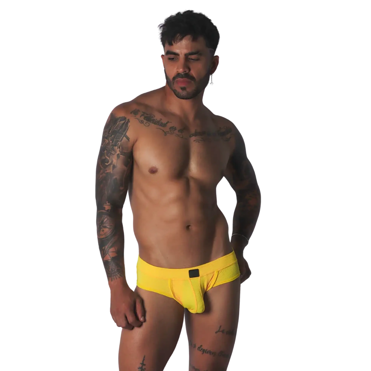 Bright yellow mesh low-rise brief with a centered rectangular black logo patch.