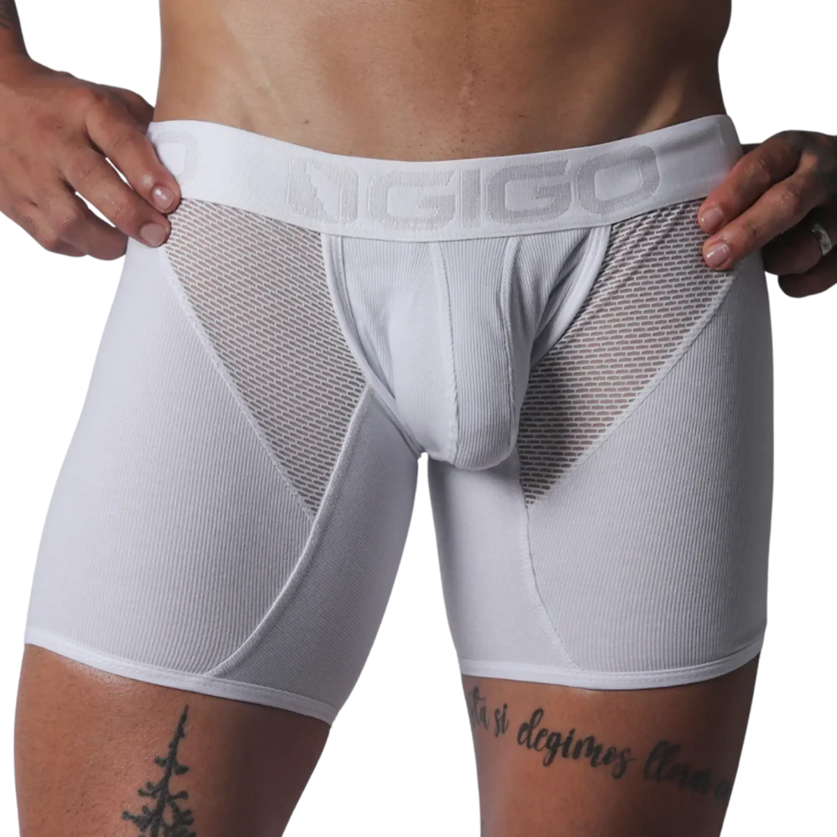 White Gigo trunk in ribbed material with sheer mesh side panels and a branded elastic waistband.