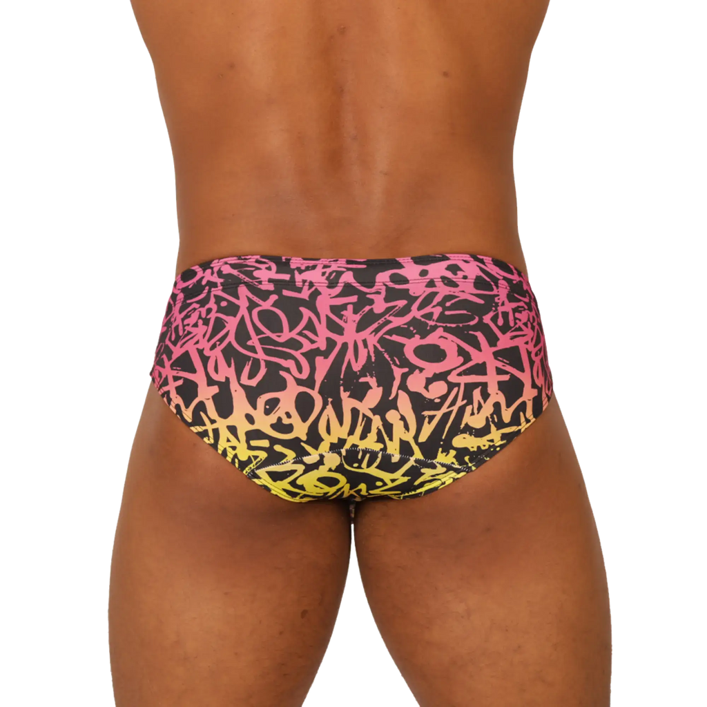 Vibrant black pink and yellow graffiti-patterned Gigo Crazy swimbrief swim trunks for bold poolside style