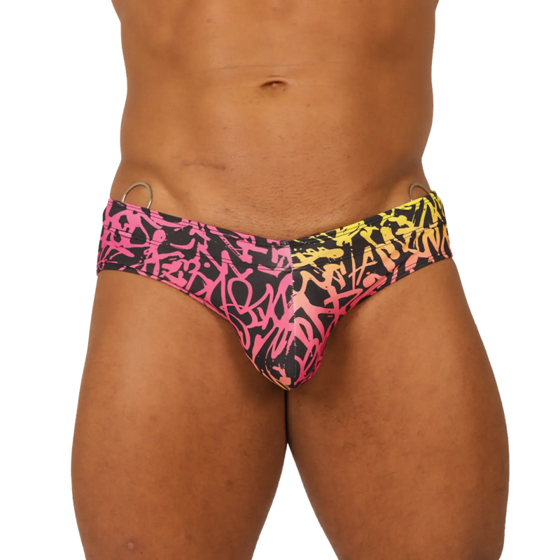 Gigo Crazy swimbrief vibrant pink and yellow graffiti-patterned swim trunks with black base for swimwear use