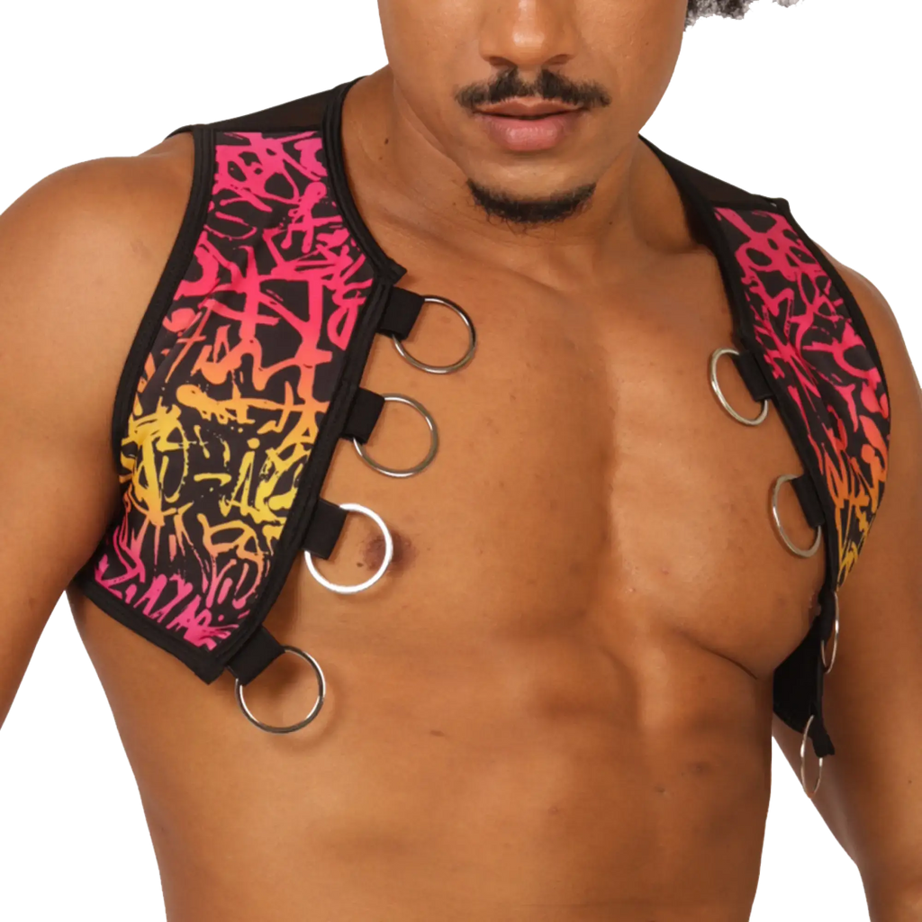 Vibrant graffiti-patterned black neoprene gigo crazy vest harness with metallic silver rings and adjustable straps