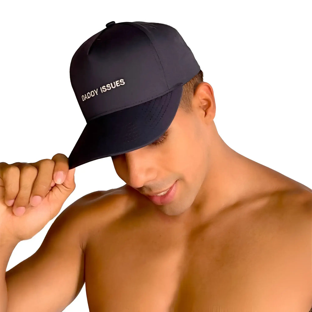 Black baseball cap by gigo with white embroidered daddy issues text on front for casual wear
